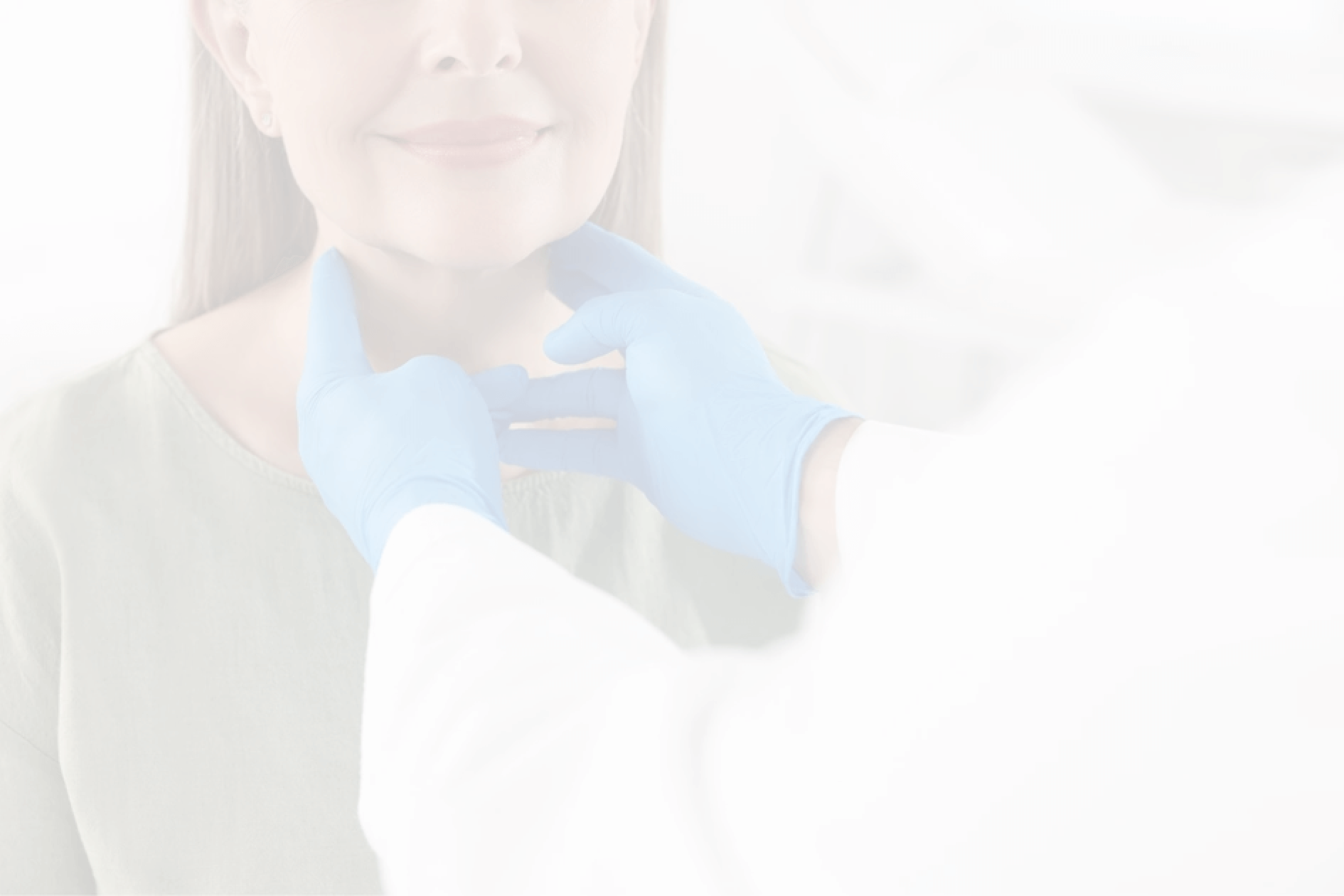 Gloved hands of doctor examining woman's throat