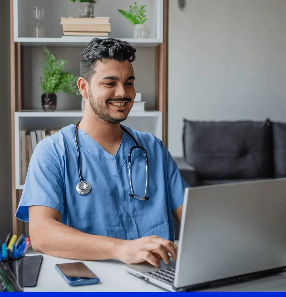 Doctor using laptop