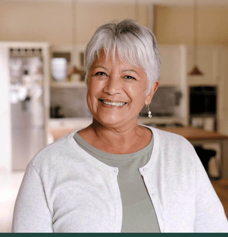 Smiling woman with gray hair