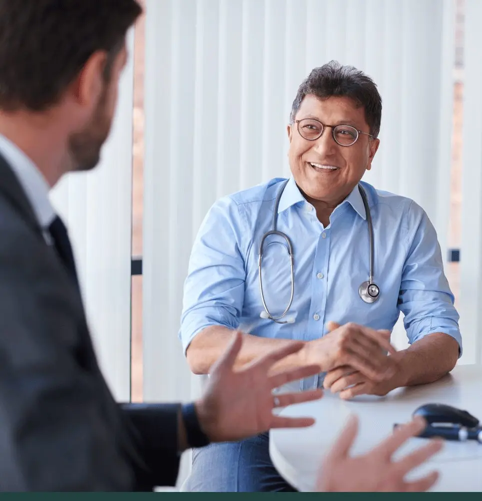 Doctor speaking with patient